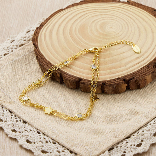 Gold Plated Layered Star Anklet Created with Zircondia® Crystals - Philip Jones Jewellery