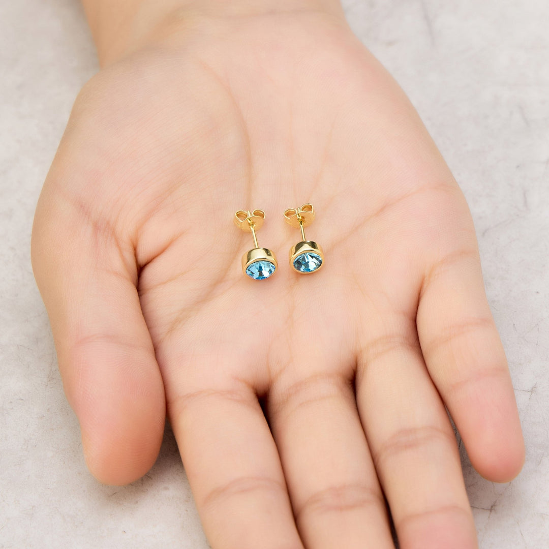 Gold Plated Light Blue Earrings Created with Zircondia® Crystals - Philip Jones Jewellery