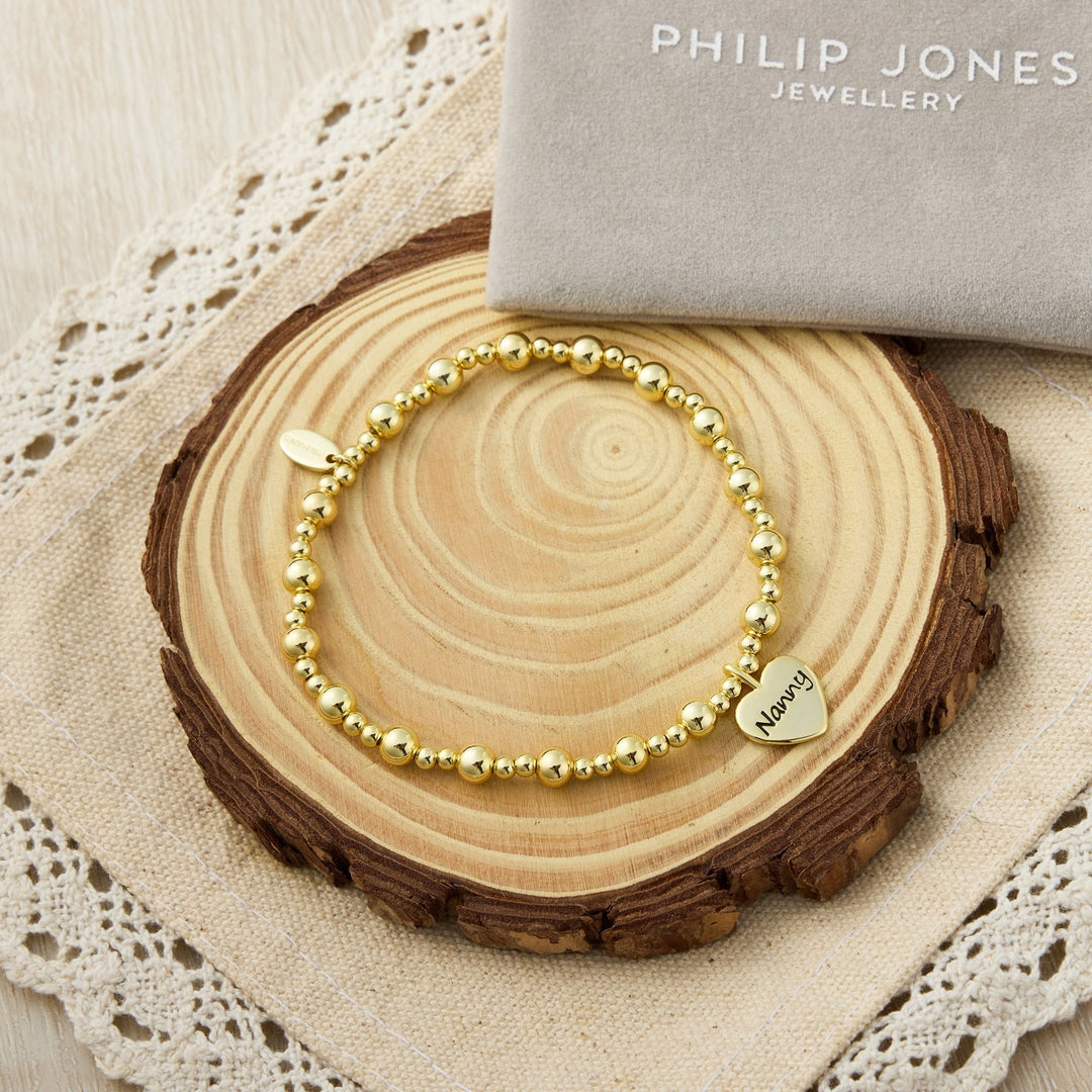 Gold Plated Nanny Heart Charm Beaded Stretch Bracelet - Philip Jones Jewellery