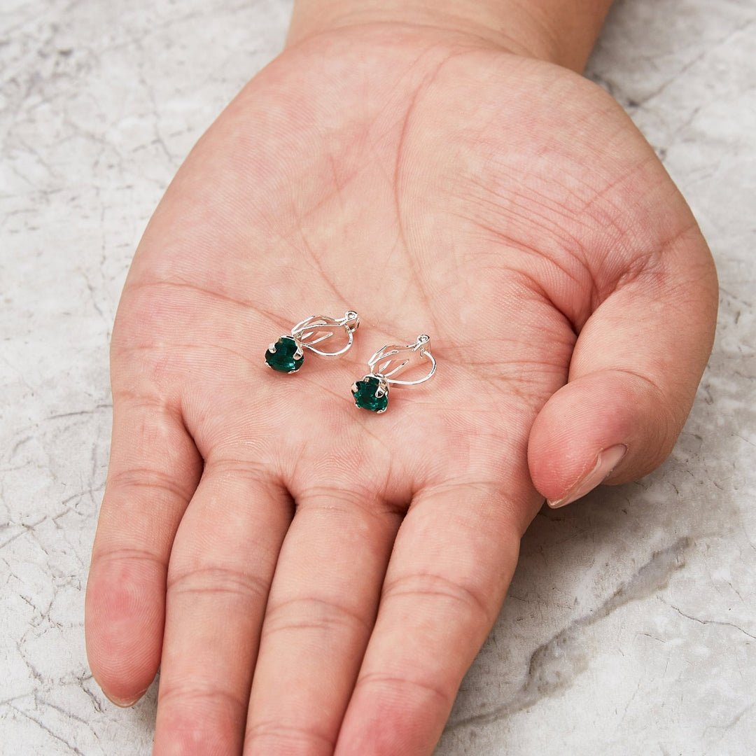 Green Crystal Clip On Earrings Created with Zircondia® Crystals - Philip Jones Jewellery