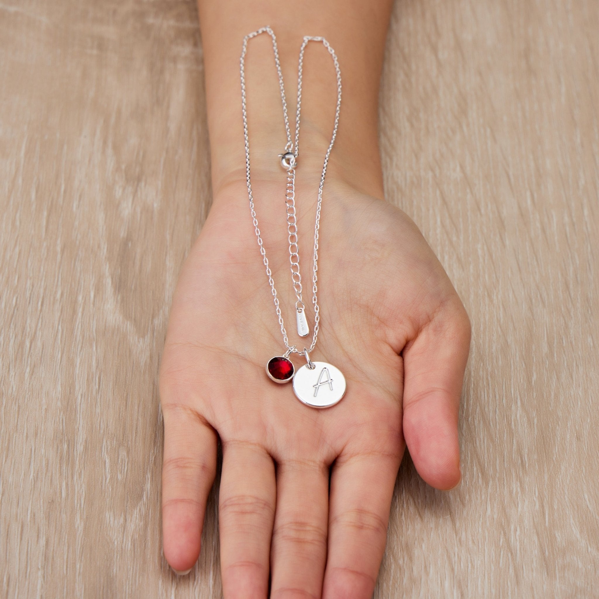 January (Garnet) Birthstone Necklace with Initial Charm (A to Z) Created with Zircondia® Crystals - Philip Jones Jewellery