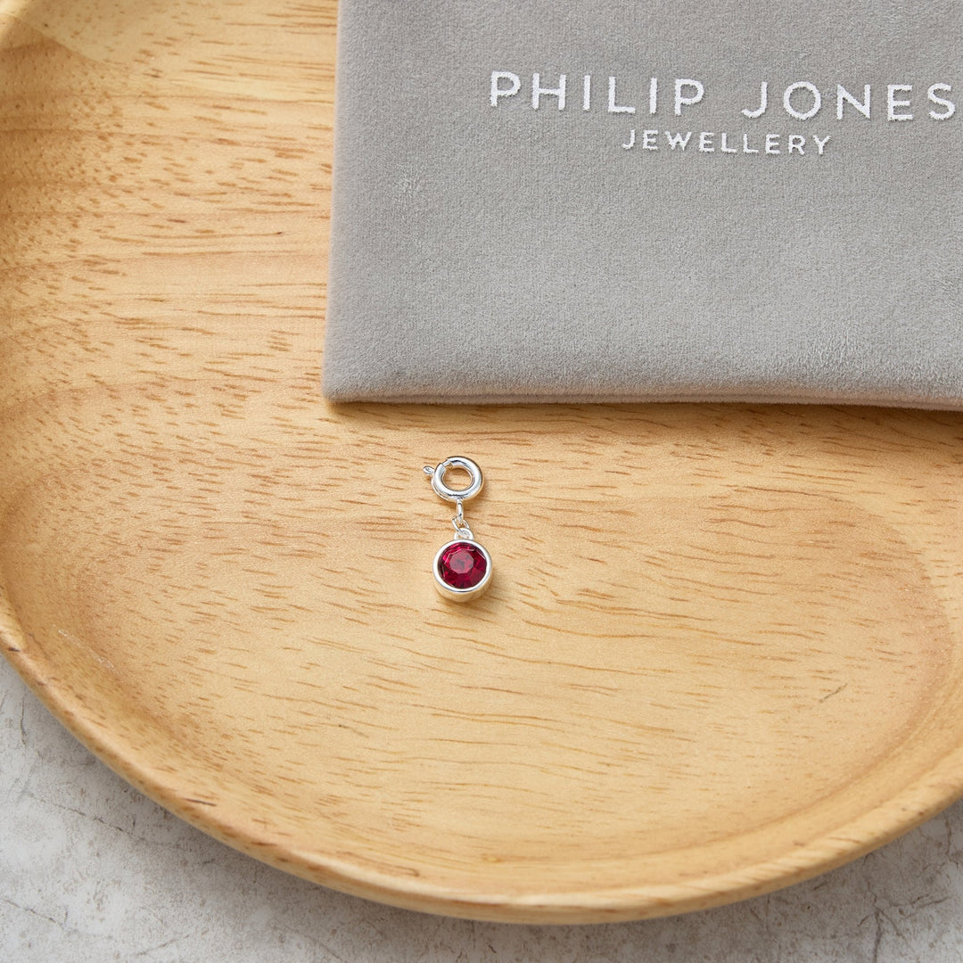 July (Ruby) Birthstone Charm Created with Zircondia® Crystals - Philip Jones Jewellery