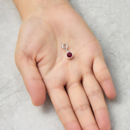 July (Ruby) Birthstone Charm Created with Zircondia® Crystals - Philip Jones Jewellery
