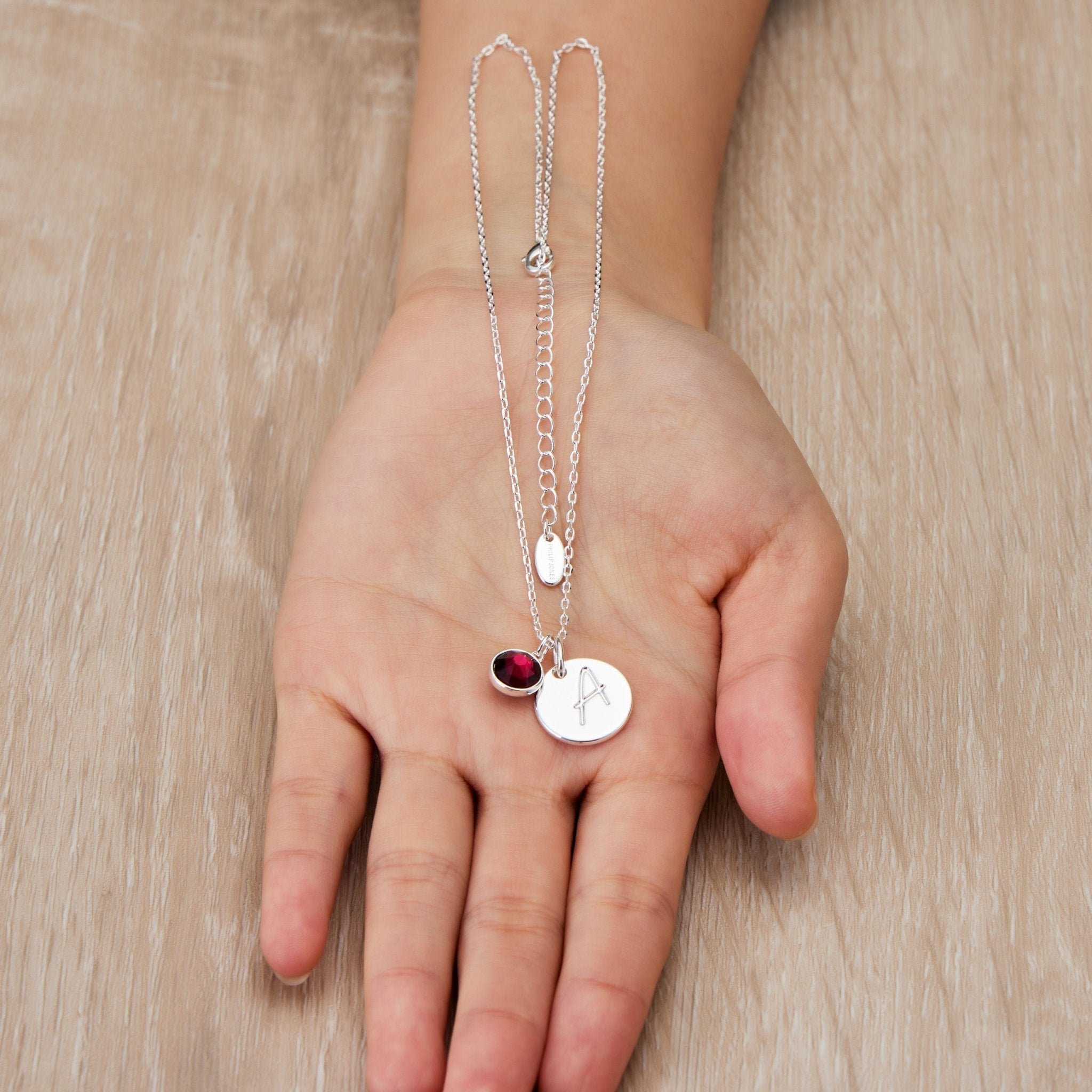 July (Ruby) Birthstone Necklace with Initial Charm (A to Z) Created with Zircondia® Crystals - Philip Jones Jewellery