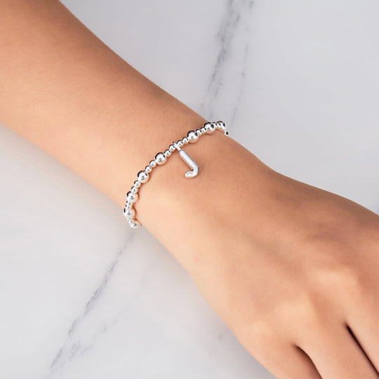 Letter J Initial Stretch Bracelet Created with Zircondia® Crystals - Philip Jones Jewellery
