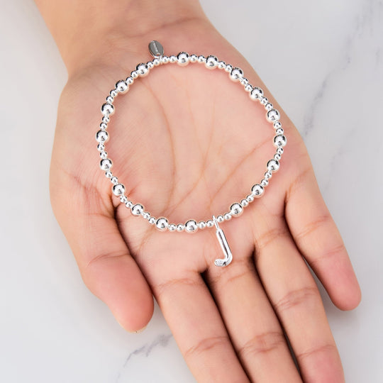 Letter J Initial Stretch Bracelet Created with Zircondia® Crystals - Philip Jones Jewellery