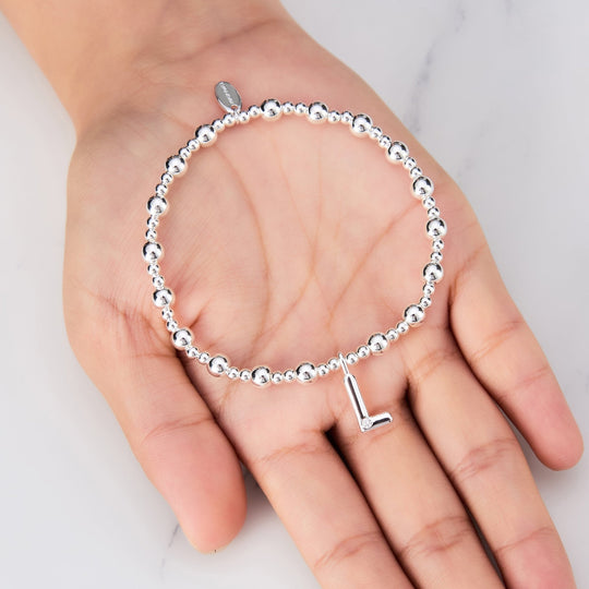 Letter L Initial Stretch Bracelet Created with Zircondia® Crystals - Philip Jones Jewellery