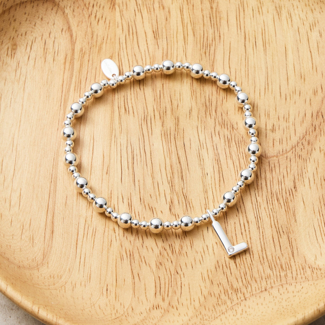 Letter L Initial Stretch Bracelet Created with Zircondia® Crystals - Philip Jones Jewellery