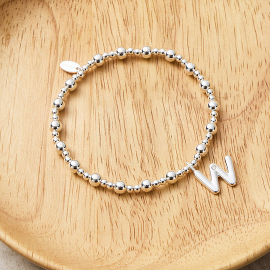 Letter W Initial Stretch Bracelet Created with Zircondia® Crystals - Philip Jones Jewellery