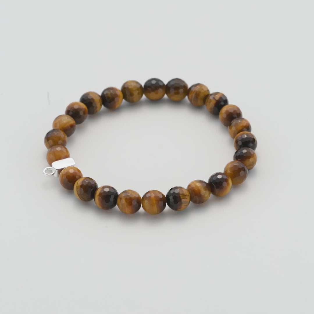 Faceted Tiger's Eye Gemstone Stretch Bracelet with Charm Created with Zircondia® Crystals Video