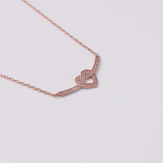 Rose Gold Plated Heart Knot Necklace Created with Zircondia® Crystals