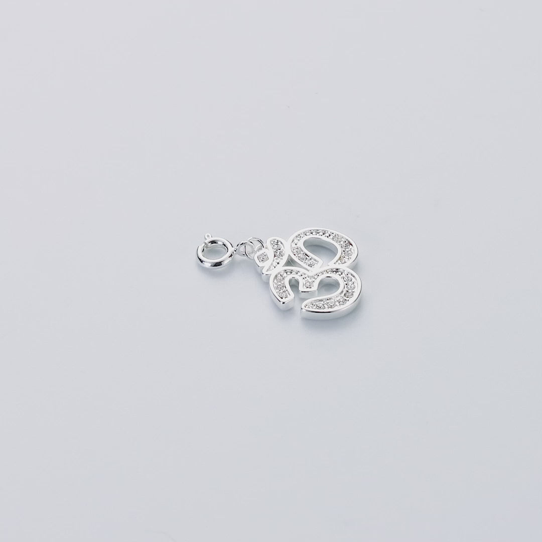 Om Charm Created with Zircondia® Crystals