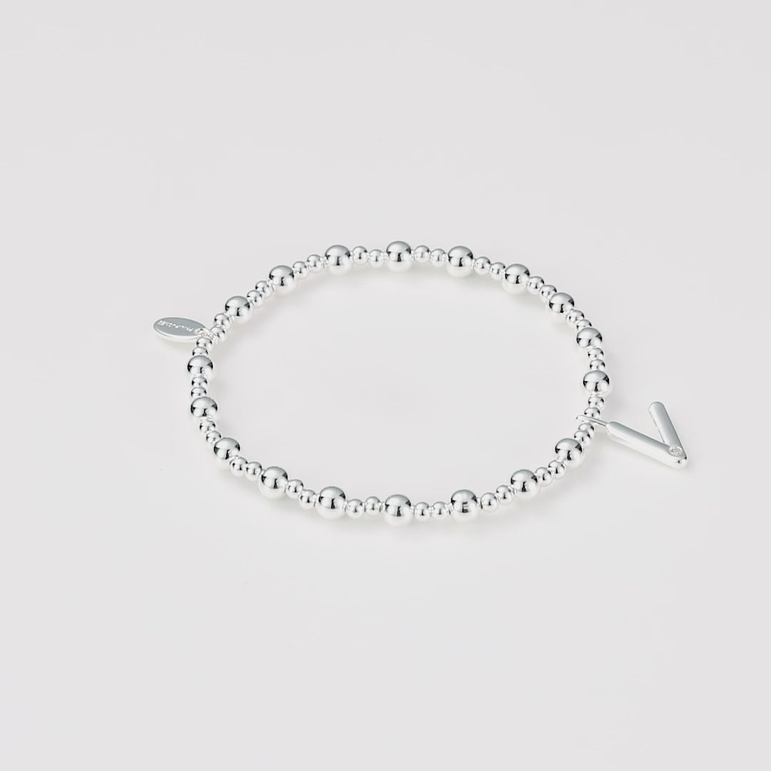 Letter V Initial Stretch Bracelet Created with Zircondia® Crystals