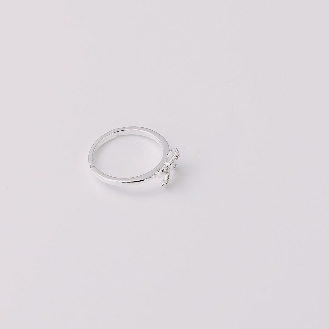 Silver Plated Bow Adjustable Ring Created with Zircondia® Crystals