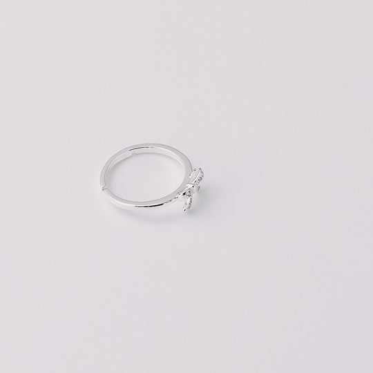 Silver Plated Bow Adjustable Ring Created with Zircondia® Crystals