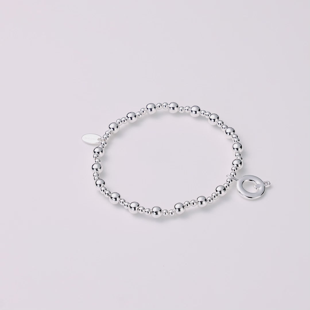 Letter Q Initial Stretch Bracelet Created with Zircondia® Crystals