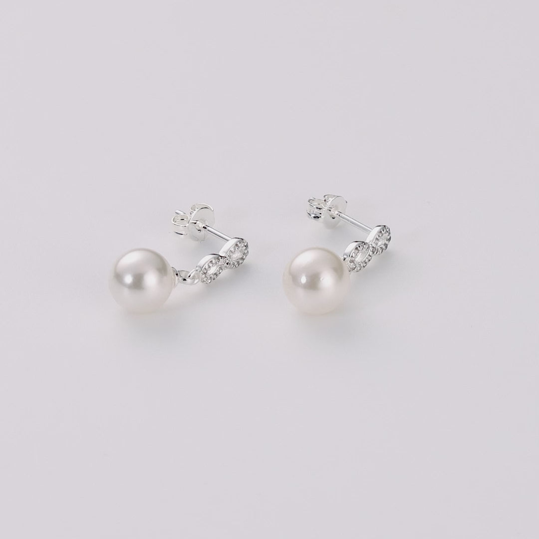 Silver Plated Infinity Pearl Drop Earrings Created with Zircondia® Crystals