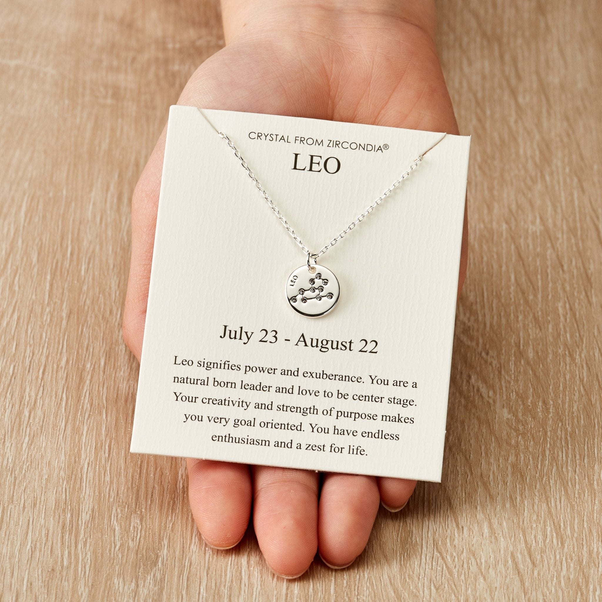 Rhodium Plated Leo Zodiac Star Sign Disc Necklace Created with Zircondia® Crystals - Philip Jones Jewellery