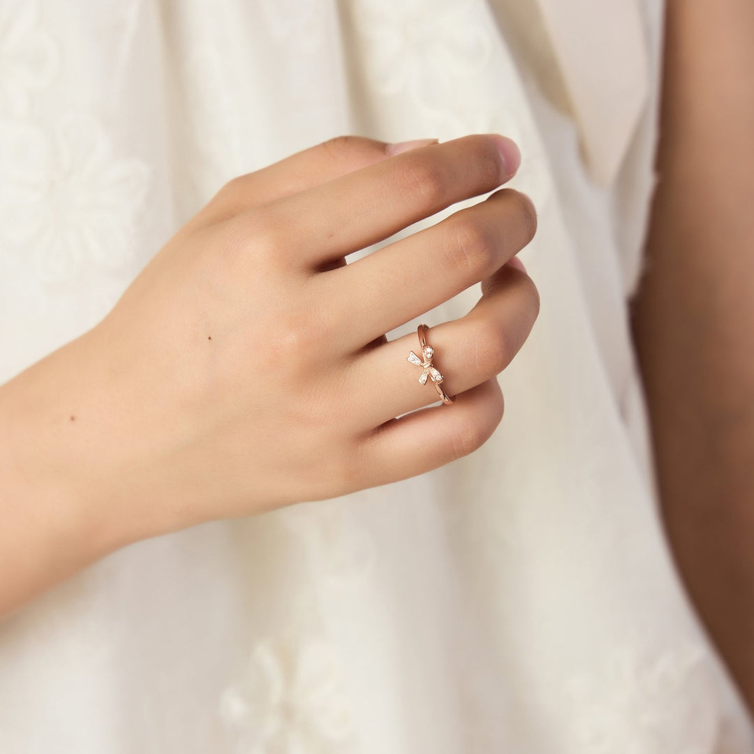 Rose Gold Plated Bow Adjustable Ring Created with Zircondia® Crystals - Philip Jones Jewellery