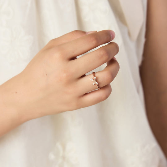 Rose Gold Plated Bow Adjustable Ring Created with Zircondia® Crystals - Philip Jones Jewellery