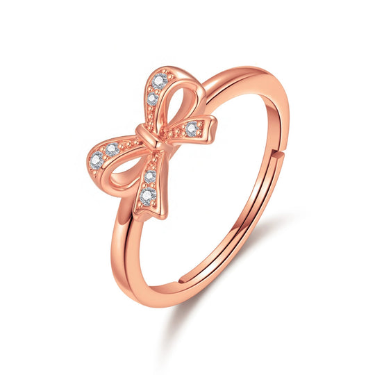 Rose Gold Plated Bow Adjustable Ring Created with Zircondia® Crystals - Philip Jones Jewellery