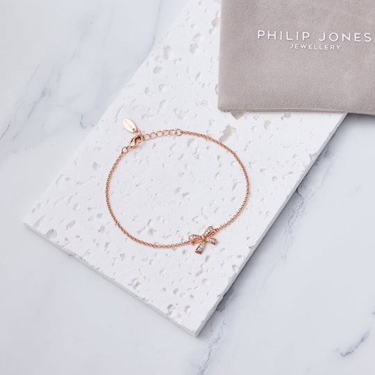 Rose Gold Plated Bow Bracelet Created with Zircondia® Crystals - Philip Jones Jewellery