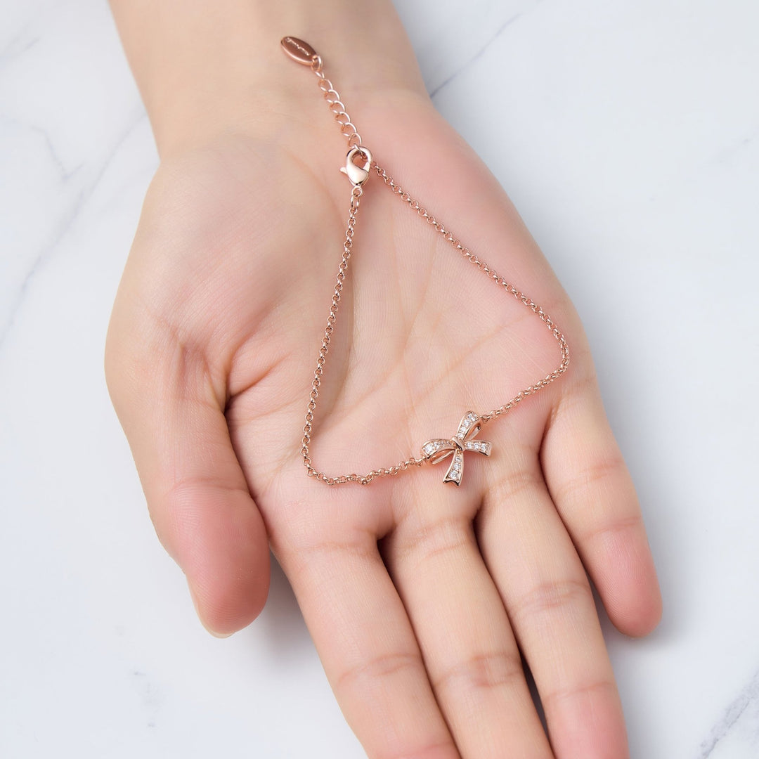 Rose Gold Plated Bow Bracelet Created with Zircondia® Crystals - Philip Jones Jewellery