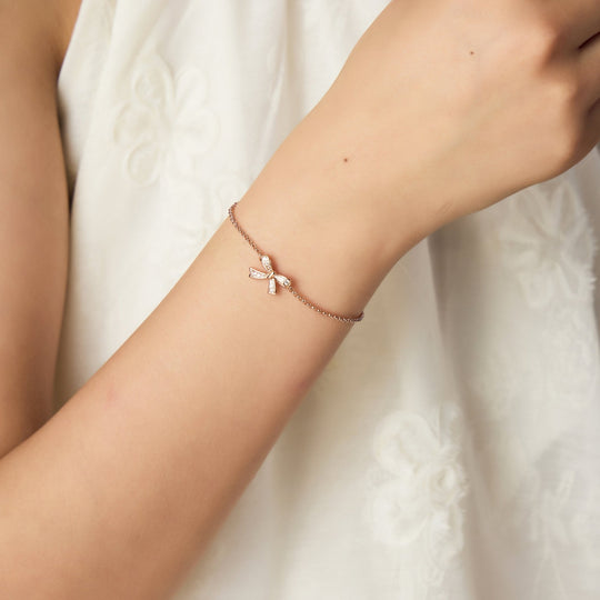 Rose Gold Plated Bow Bracelet Created with Zircondia® Crystals - Philip Jones Jewellery
