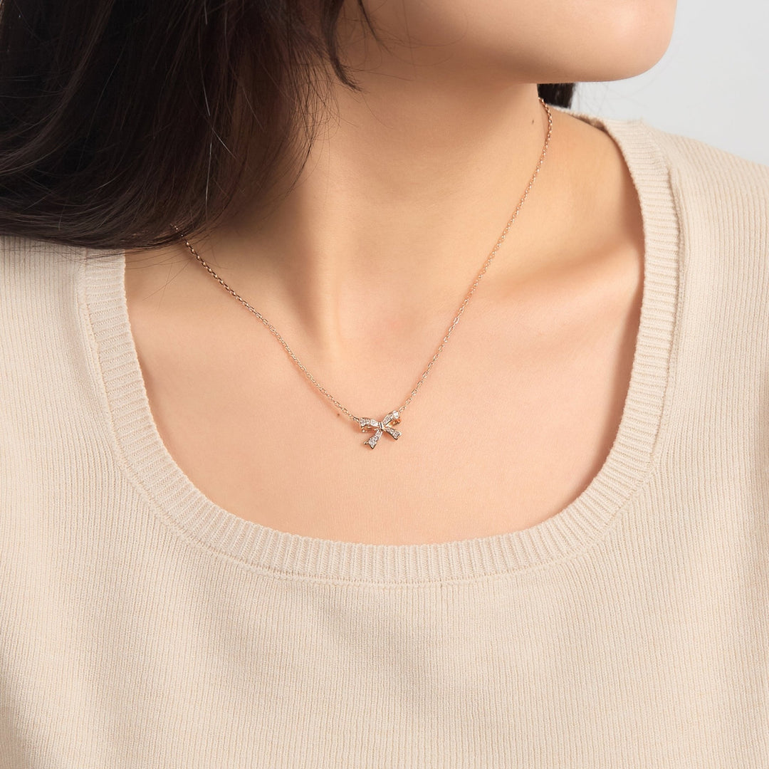 Rose Gold Plated Bow Necklace Created with Zircondia® Crystals - Philip Jones Jewellery