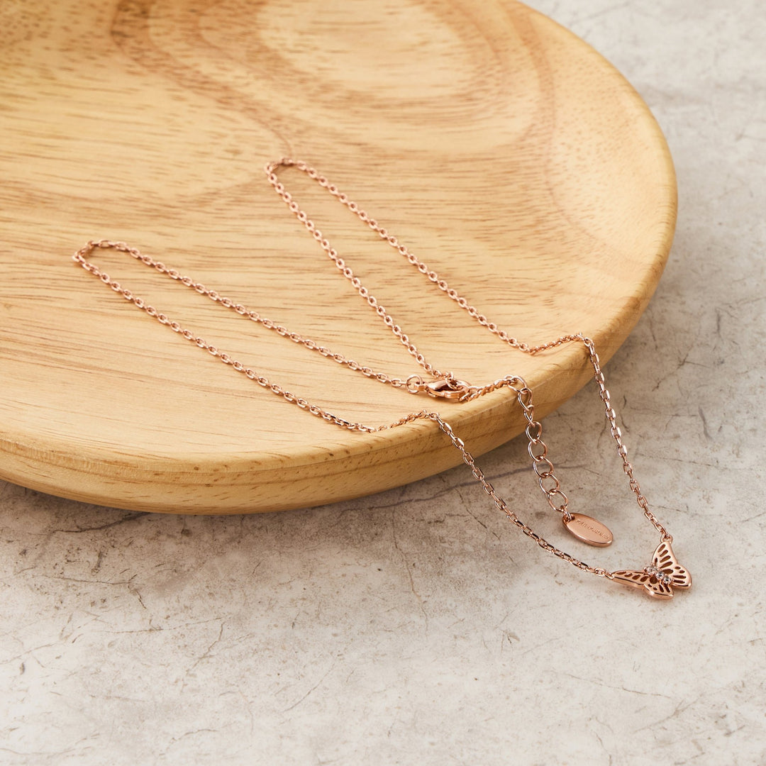 Rose Gold Plated Butterfly Necklace Created with Zircondia® Crystals - Philip Jones Jewellery