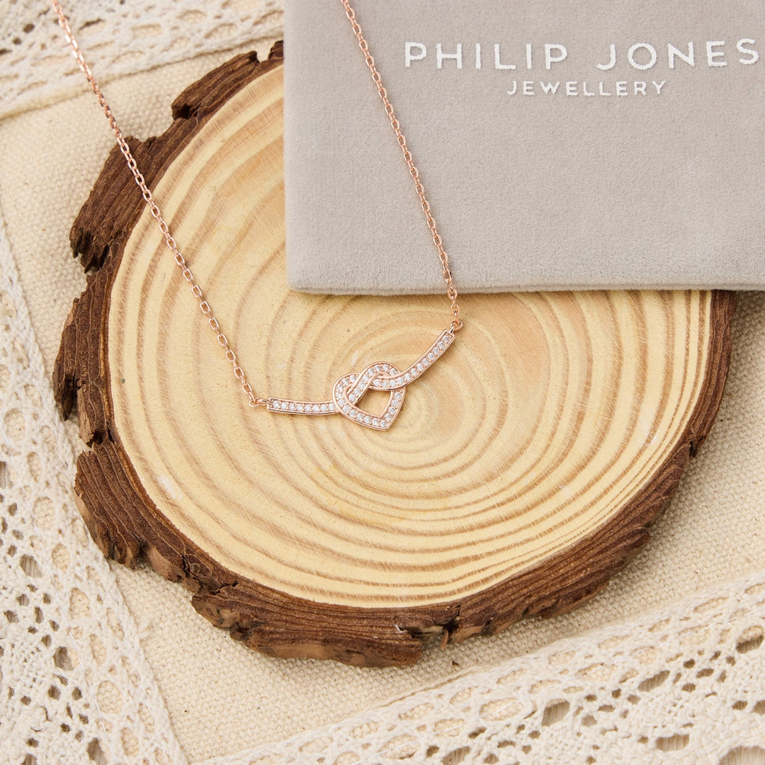 Rose Gold Plated Heart Knot Necklace Created with Zircondia® Crystals - Philip Jones Jewellery