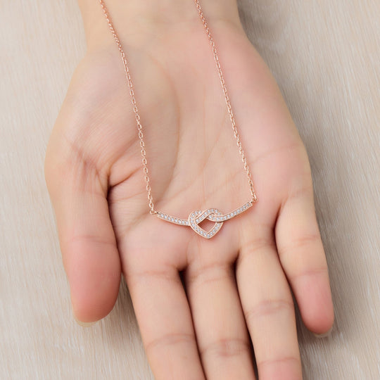 Rose Gold Plated Heart Knot Necklace Created with Zircondia® Crystals - Philip Jones Jewellery