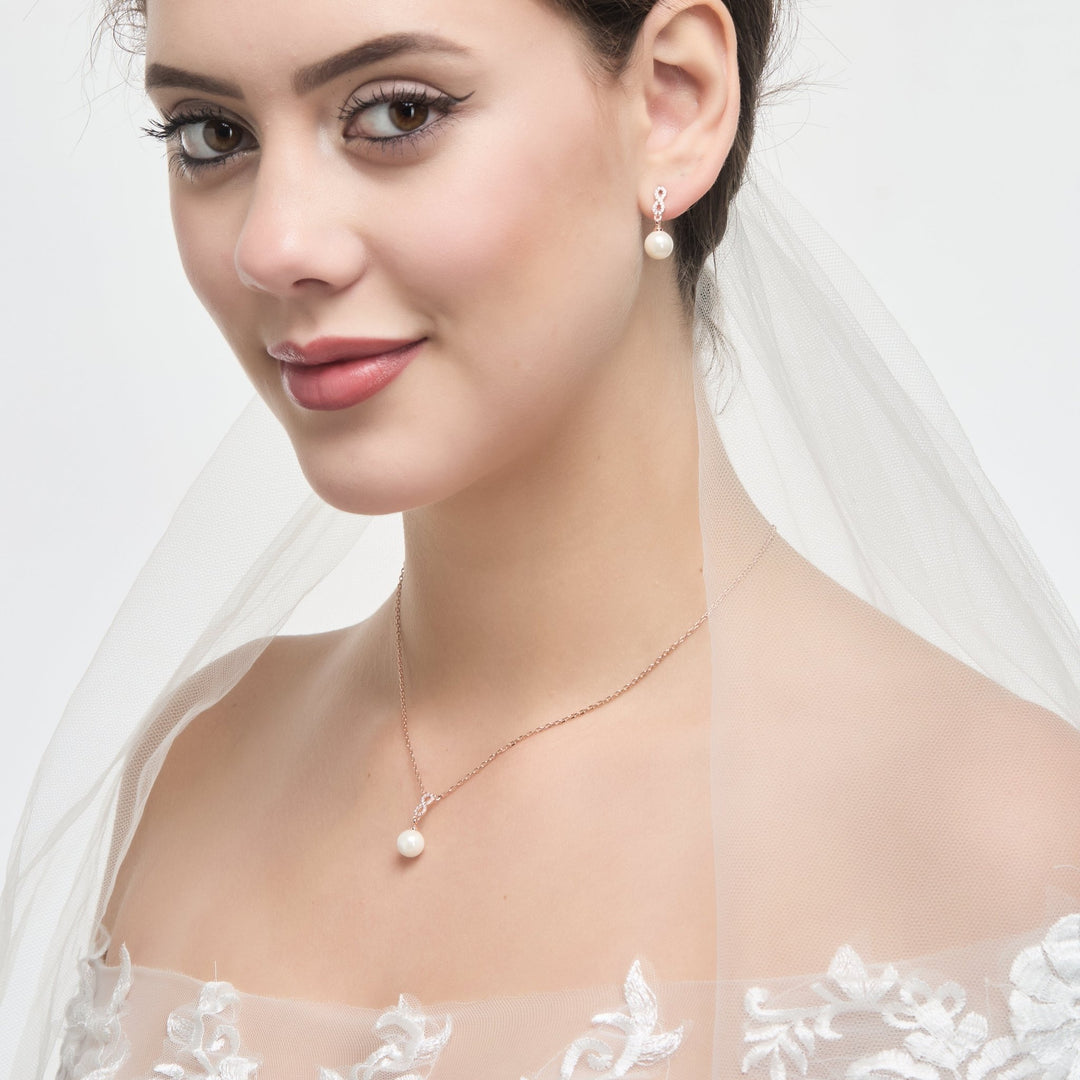 Rose Gold Plated Infinity Pearl Drop Bridal Set Created with Zircondia® Crystals - Philip Jones Jewellery