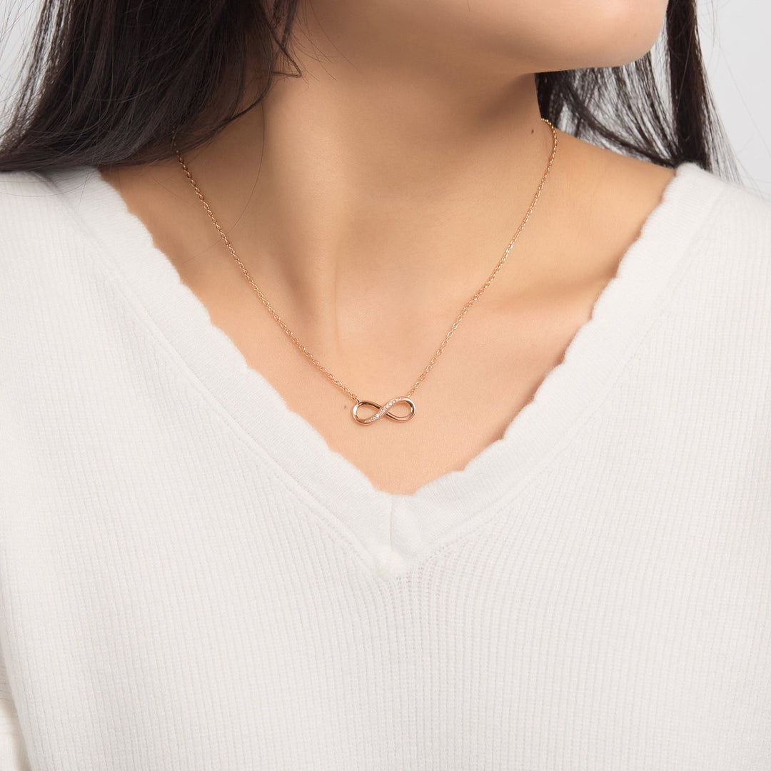Rose Gold Plated Infinity Pendant Necklace Created with Zircondia® Crystals - Philip Jones Jewellery