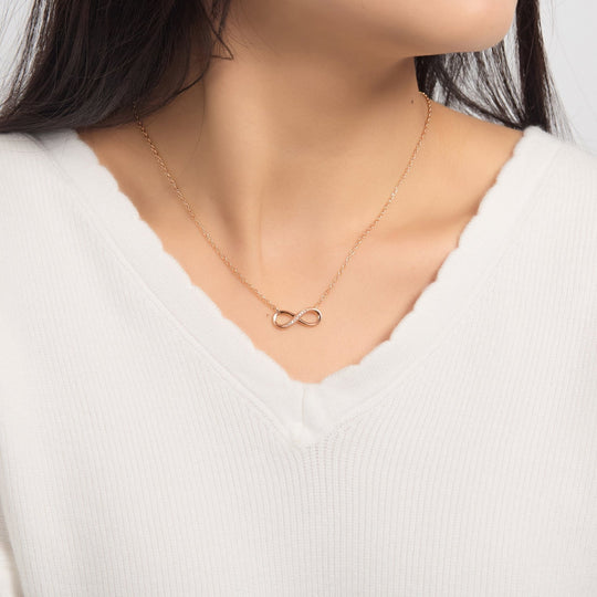 Rose Gold Plated Infinity Pendant Necklace Created with Zircondia® Crystals - Philip Jones Jewellery