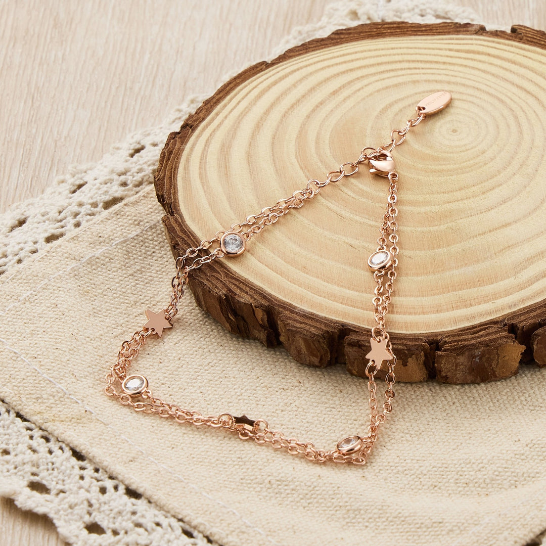 Rose Gold Plated Layered Star Anklet Created with Zircondia® Crystals - Philip Jones Jewellery