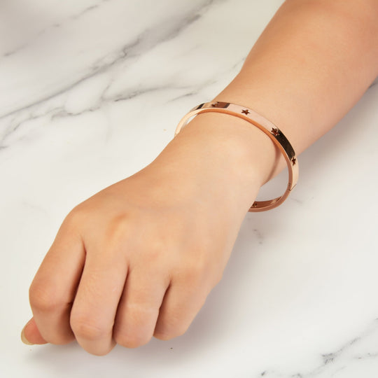 Rose Gold Plated Stainless Steel Star Bangle (7 Inch) - Philip Jones Jewellery