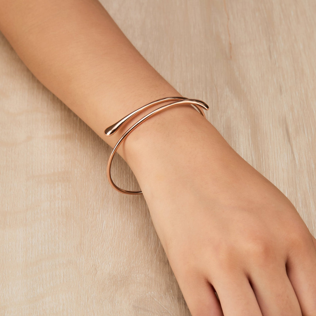 Rose Gold Plated Teardrop Bangle - Philip Jones Jewellery