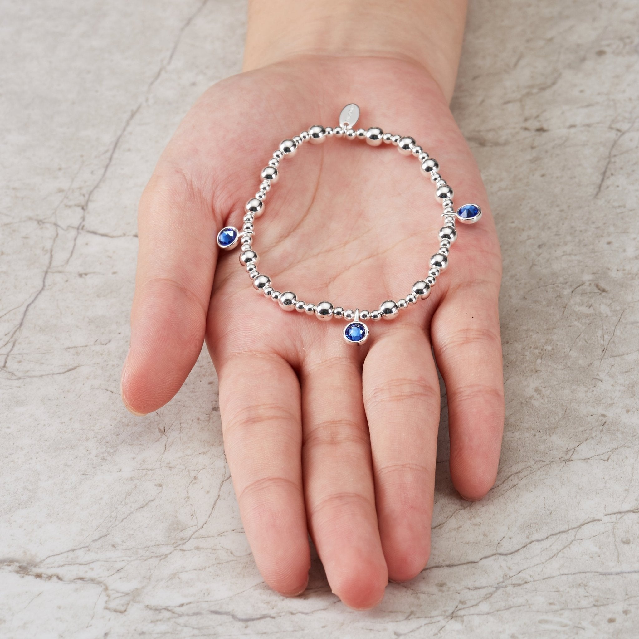 September (Sapphire) Birthstone Stretch Charm Bracelet with Quote Gift Box - Philip Jones Jewellery