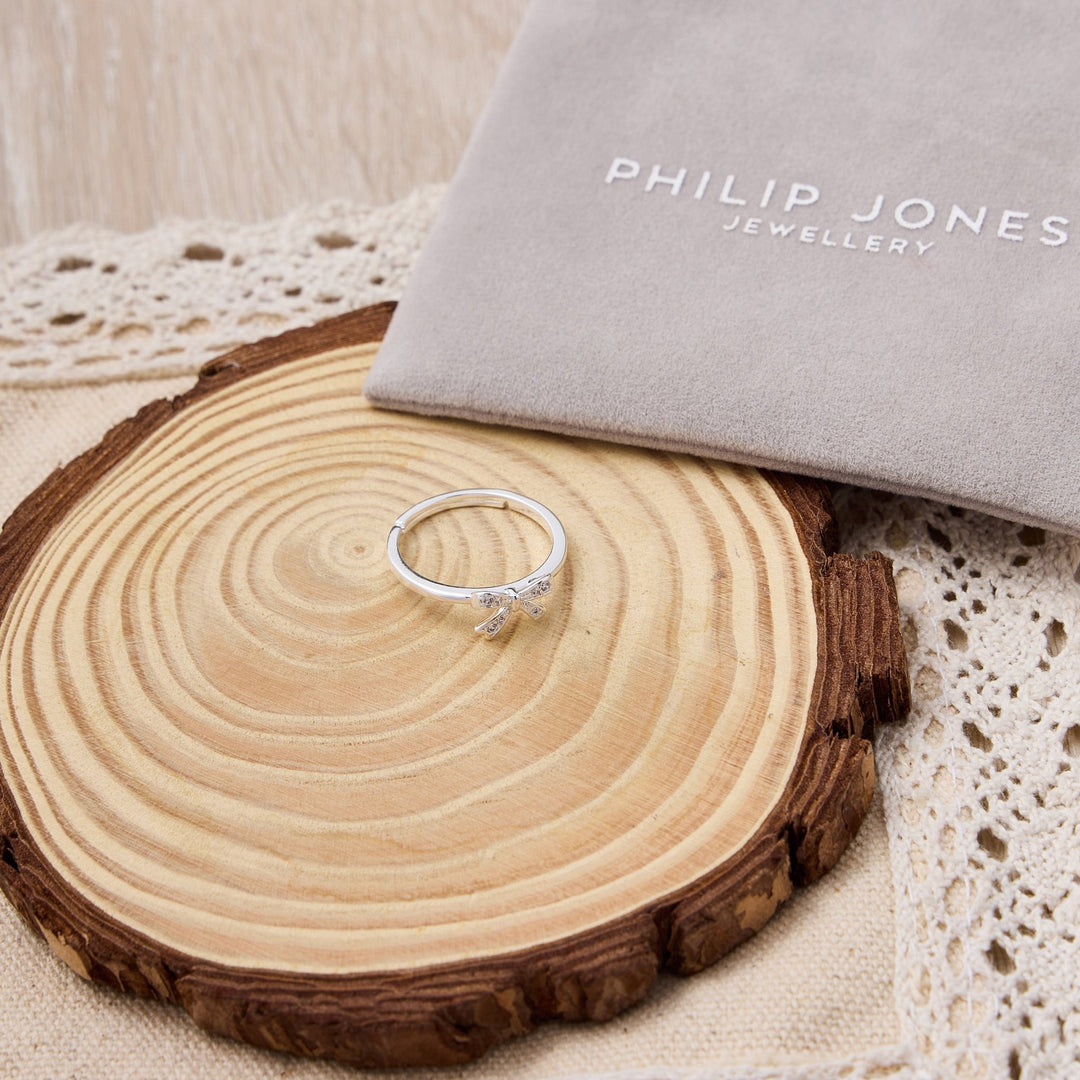 Silver Plated Bow Adjustable Ring Created with Zircondia® Crystals - Philip Jones Jewellery