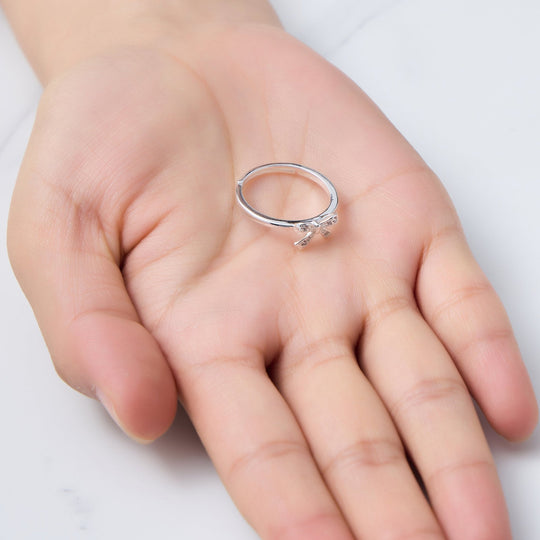 Silver Plated Bow Adjustable Ring Created with Zircondia® Crystals - Philip Jones Jewellery