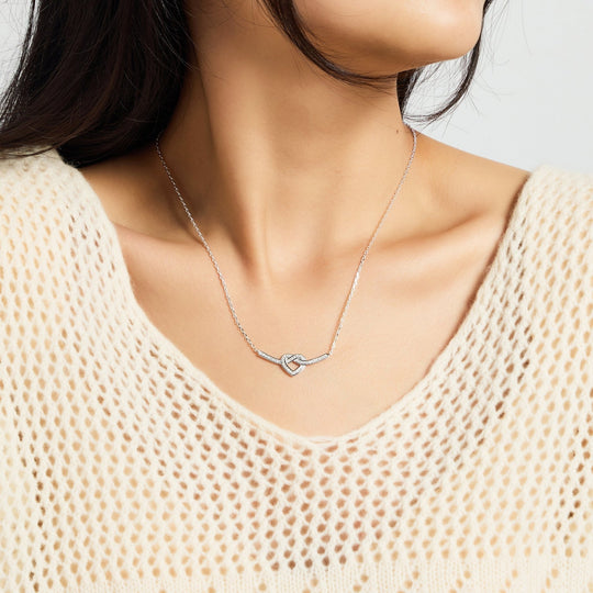 Silver Plated Heart Knot Necklace Created with Zircondia® Crystals - Philip Jones Jewellery