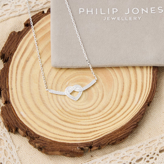 Silver Plated Heart Knot Necklace Created with Zircondia® Crystals - Philip Jones Jewellery