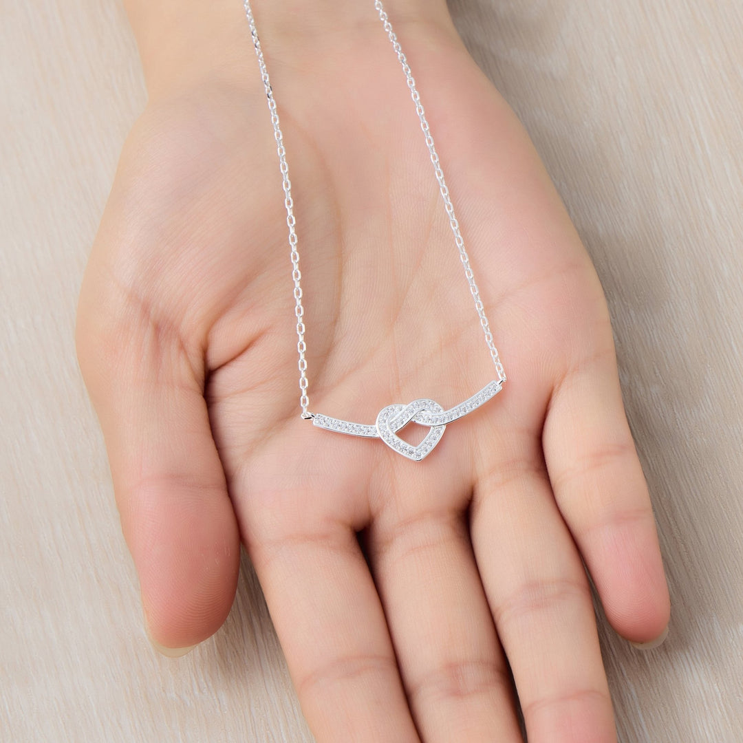 Silver Plated Heart Knot Necklace Created with Zircondia® Crystals - Philip Jones Jewellery