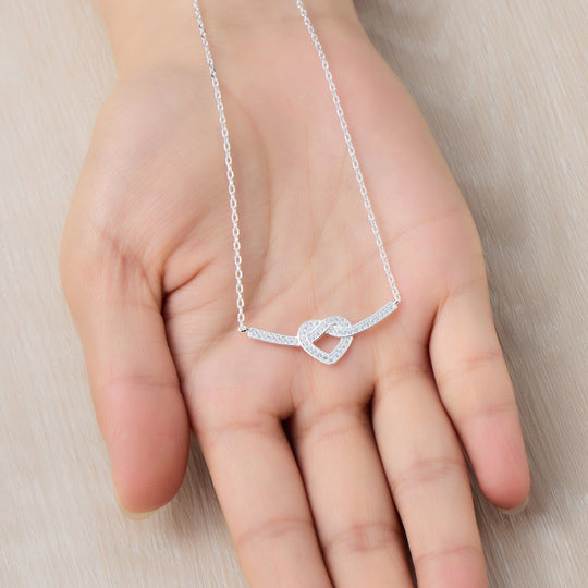 Silver Plated Heart Knot Necklace Created with Zircondia® Crystals - Philip Jones Jewellery