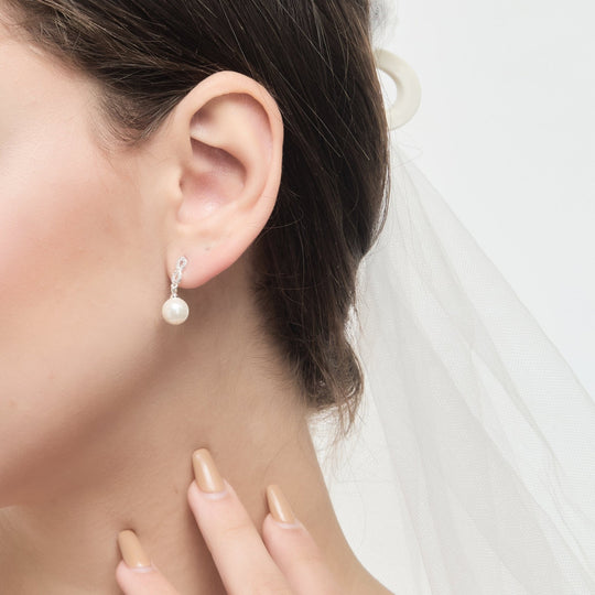 Silver Plated Infinity Pearl Drop Bridal Earrings Created with Zircondia® Crystals - Philip Jones Jewellery