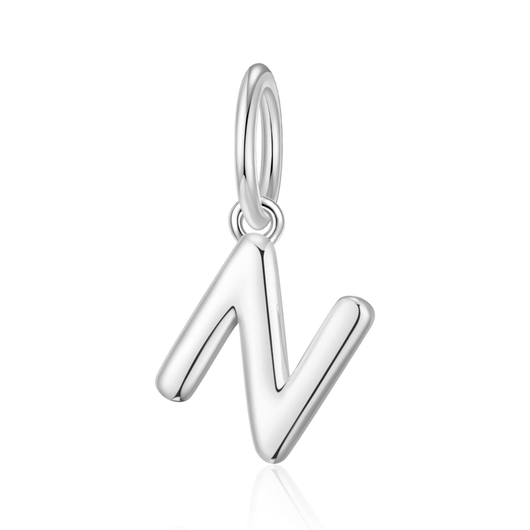 Silver Plated Initial Necklace Charms Lifestyle Images by Philip Jones
