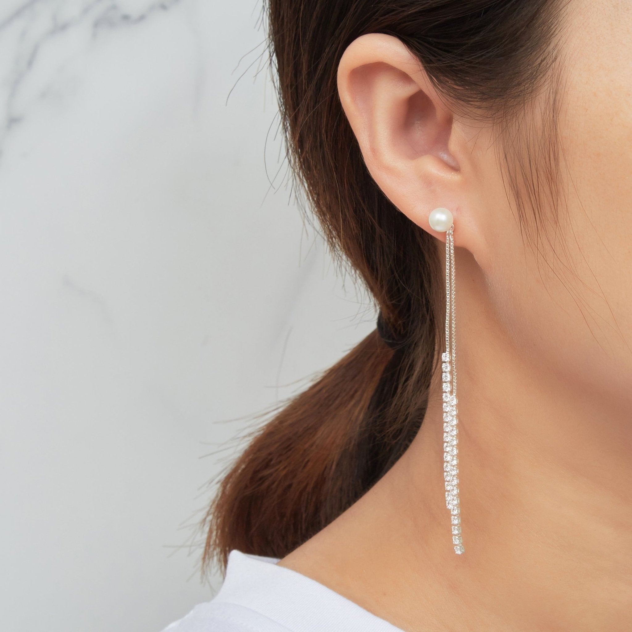 Silver Plated Pearl Dangle Earrings Created with Zircondia® Crystals - Philip Jones Jewellery