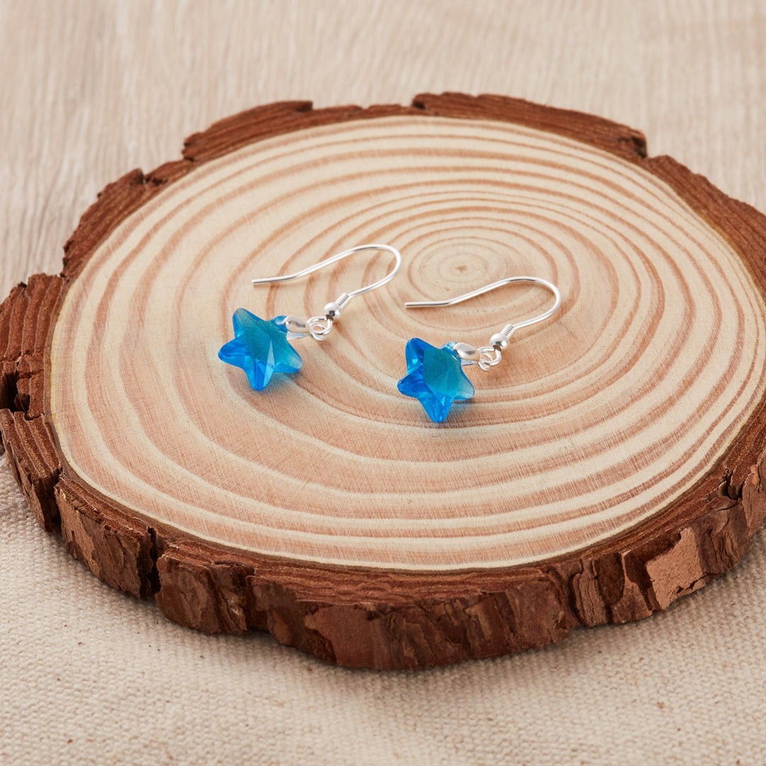 Sterling Silver Aquamarine Star Earrings Created with Zircondia® Crystals - Philip Jones Jewellery