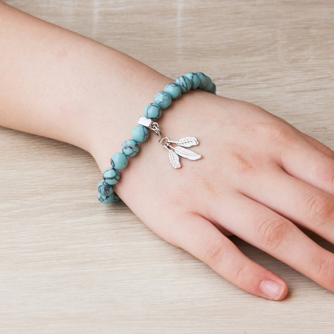 Synthetic Turquoise Gemstone Stretch Bracelet with Charm Created with Zircondia® Crystals - Philip Jones Jewellery